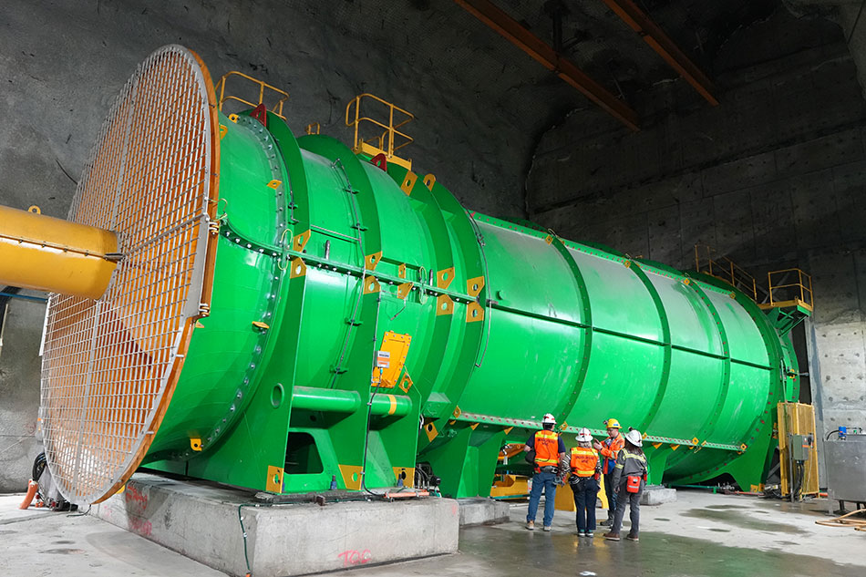 A crew inspects the massive ventilation fan at PTFI, one of the largest underground fans in the world