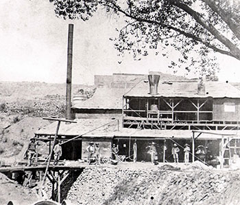 An early smelter built to process ore from the Morenci mines is shown in this photo from the 1880s.